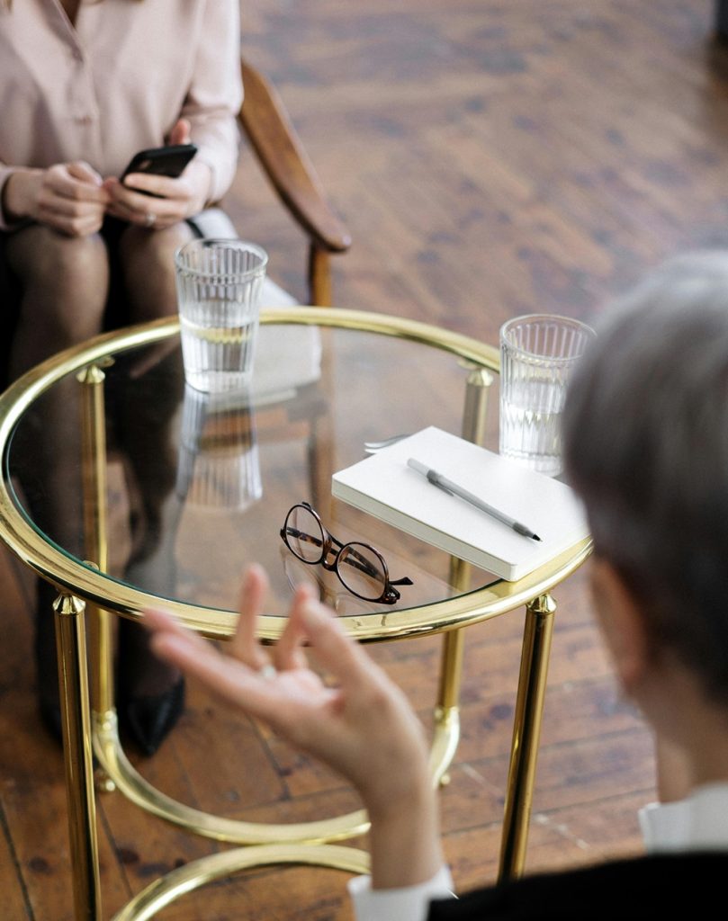 Therapist speaking during a couples therapy session.